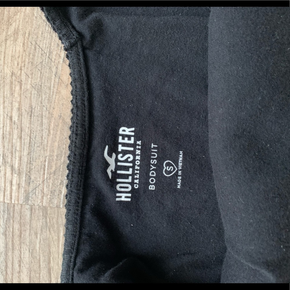 Black ribbed body suit